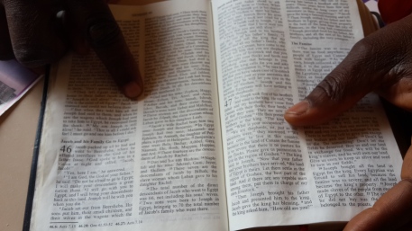 HOLINESS: Rabbi Obiekwe does a reading from a Jewish scripture and shows how they've traced their lineage through this biblical passage. Photo: Ilanit Chernick