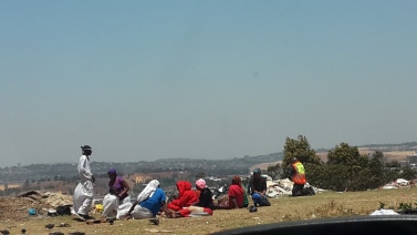 COLOURFUL PRAYER: A group of Christian worshipers praying on the hill top in Yeoville. Photo: Ilanit Chernick 